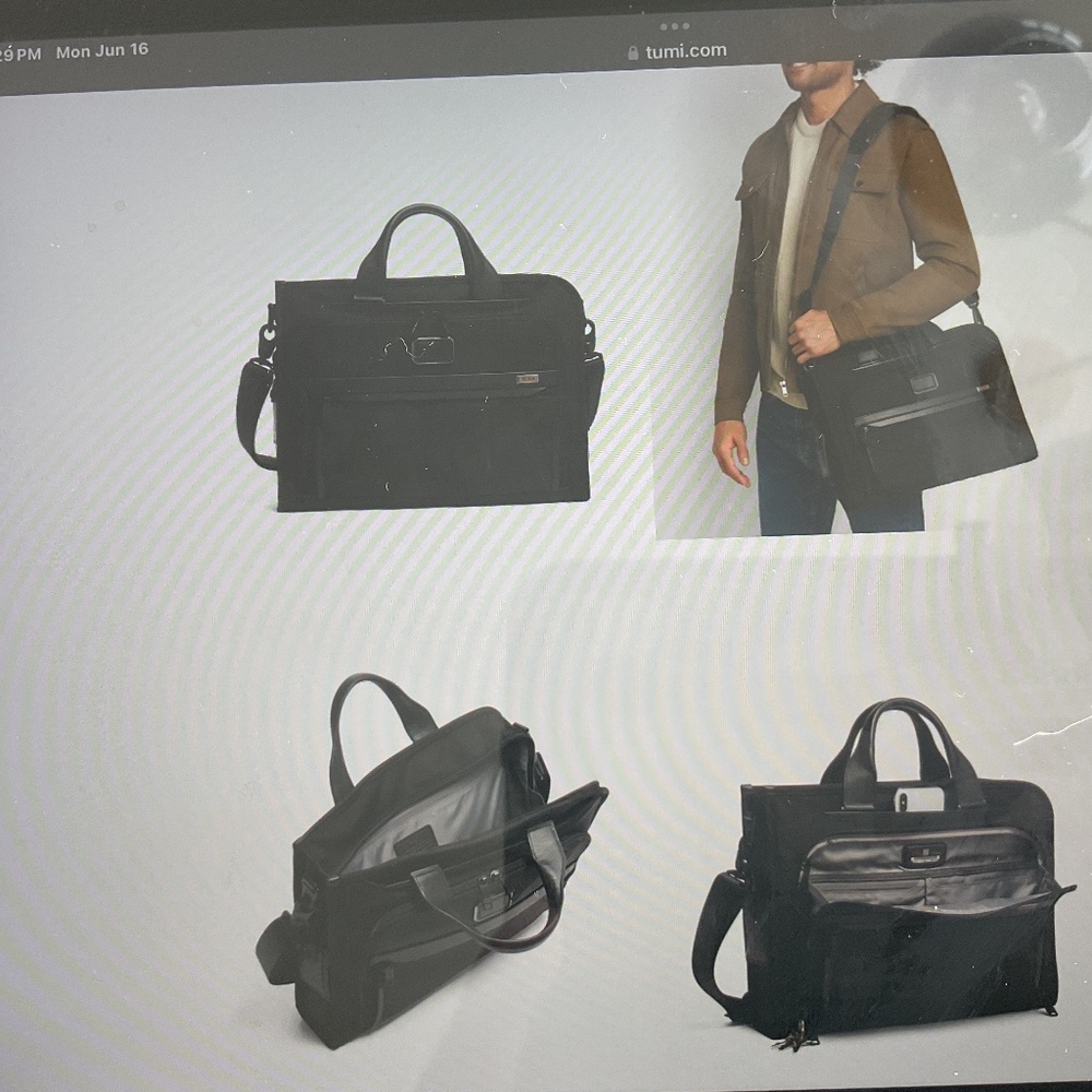 TUMI  Slim Deluxe Portfolio
